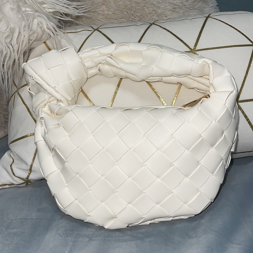Mini Jodie woven handbag.